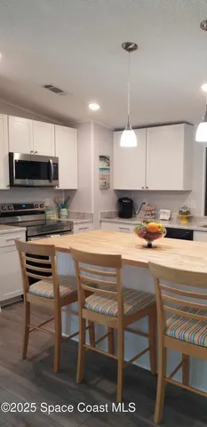 $254,000 | 843 Sapodilla Drive, Barefoot Bay, FL 32976