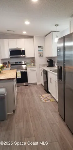 $254,000 | 843 Sapodilla Drive, Barefoot Bay, FL 32976