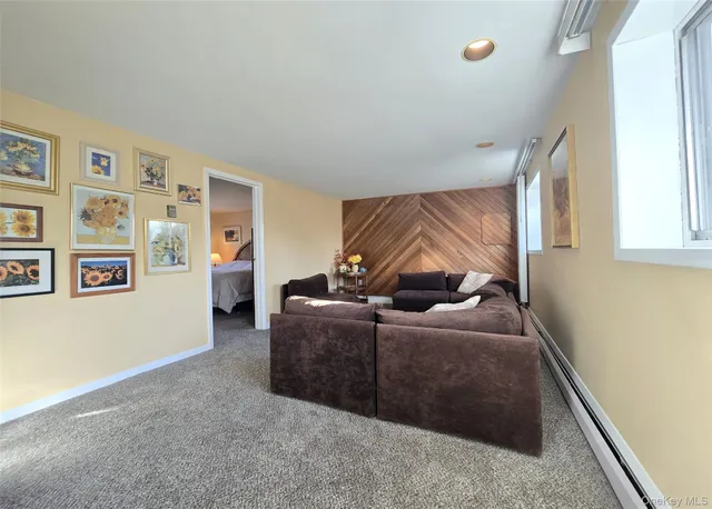 a living room with furniture and window