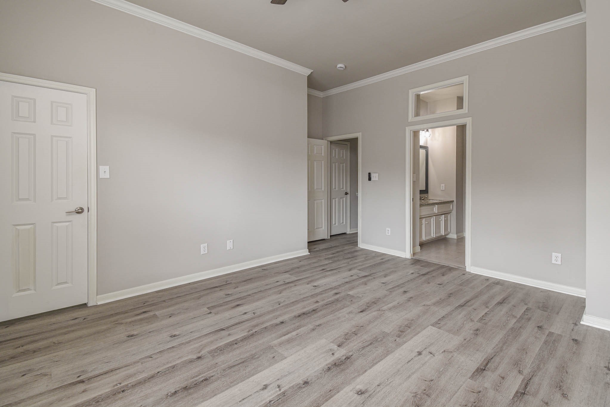 1729 Tuam Street Houston, TX 77004 - Photo 16 of 23 a view of wooden floor and windows in a room