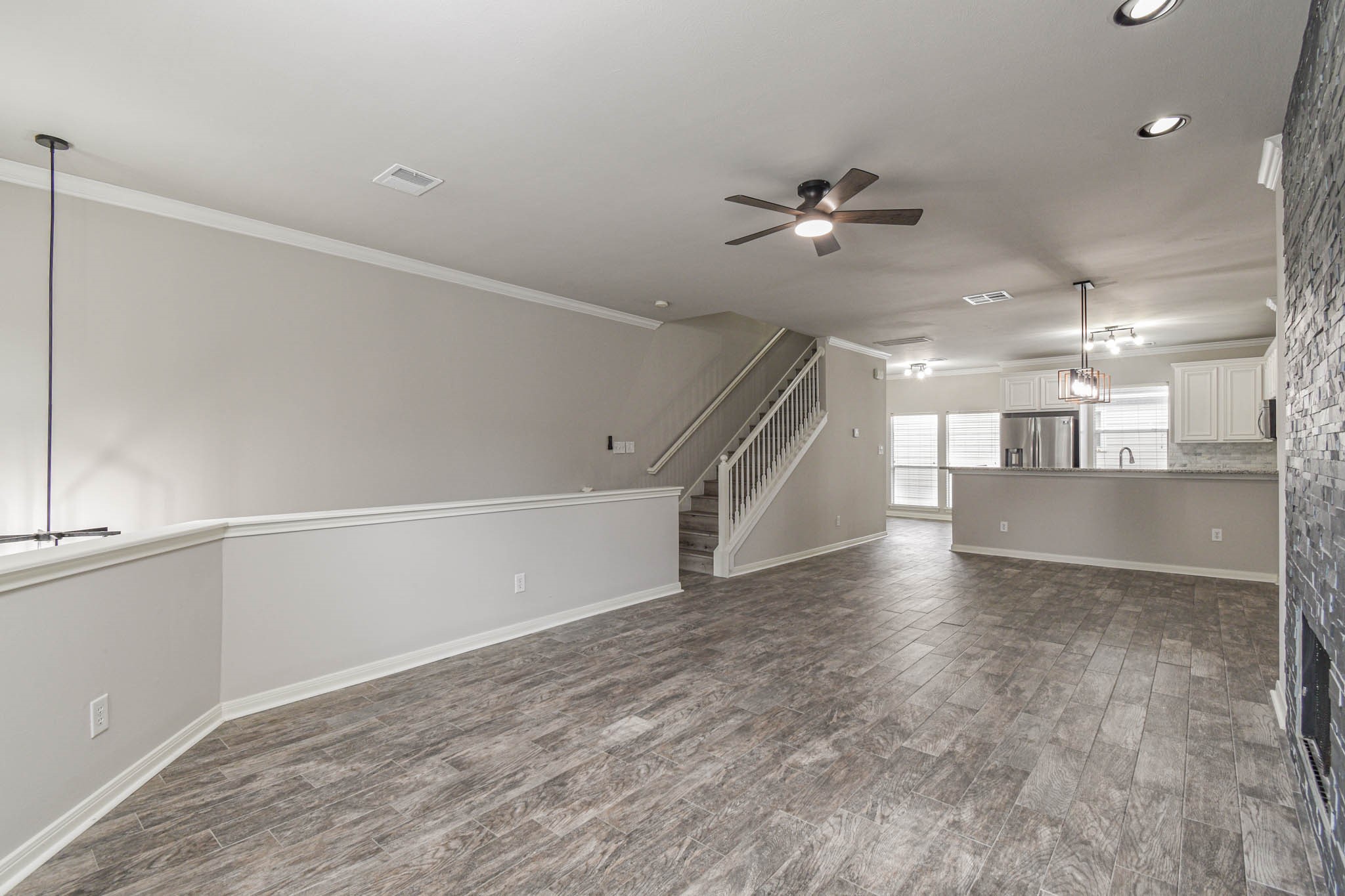 1729 Tuam Street Houston, TX 77004 - Photo 3 of 23 wooden floor in an empty room with a window