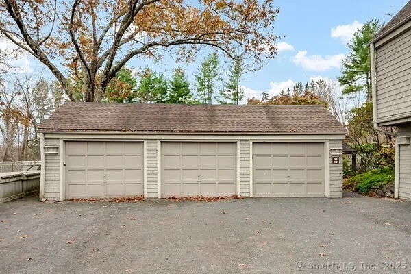 front view of a house with a parking area