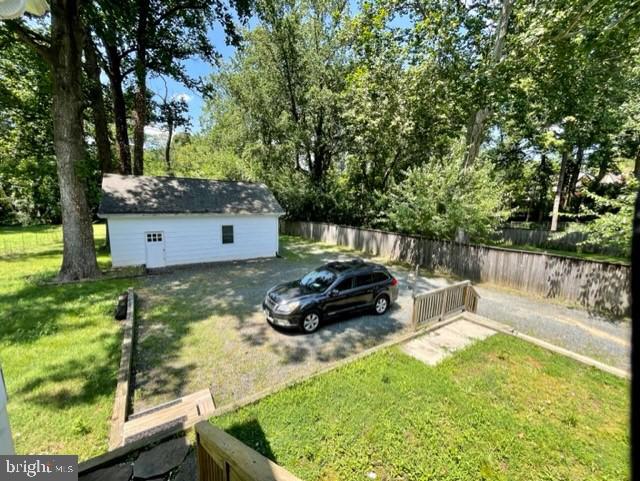 225 B Dewey Drive, Unit B Annapolis, MD 21401 - Photo 14 of 15 a backyard of a house with table and chairs