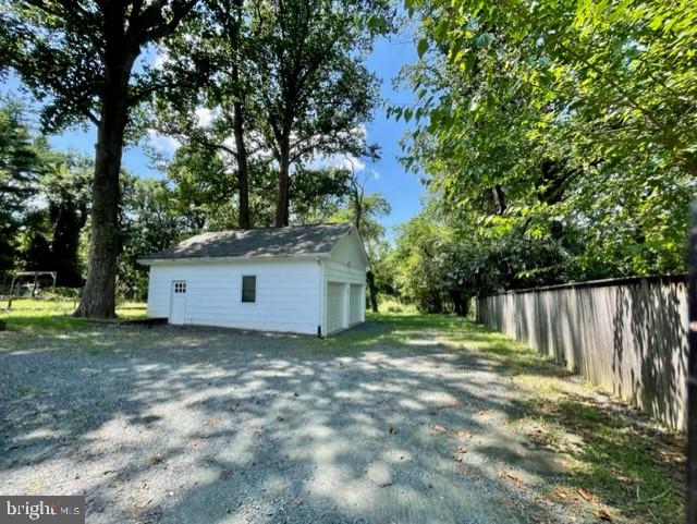 225 B Dewey Drive, Unit B Annapolis, MD 21401 - Photo 2 of 15 a house with trees in front of it