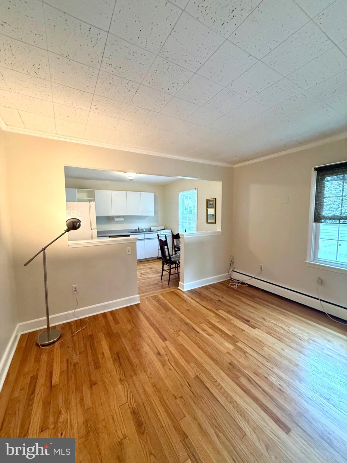 225 B Dewey Drive, Unit B Annapolis, MD 21401 - Photo 7 of 15 a view of empty room with wooden floor