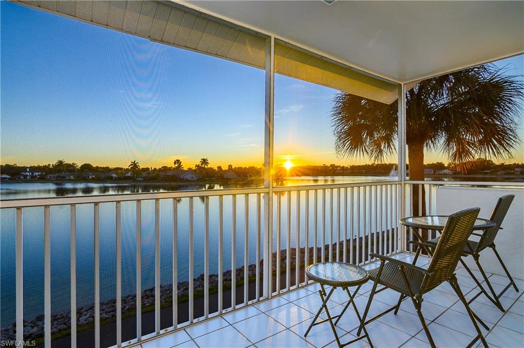 541 Windsor Square, Unit 202 Naples, FL 34104 - Photo 28 of 36 a view of a chairs on the roof deck