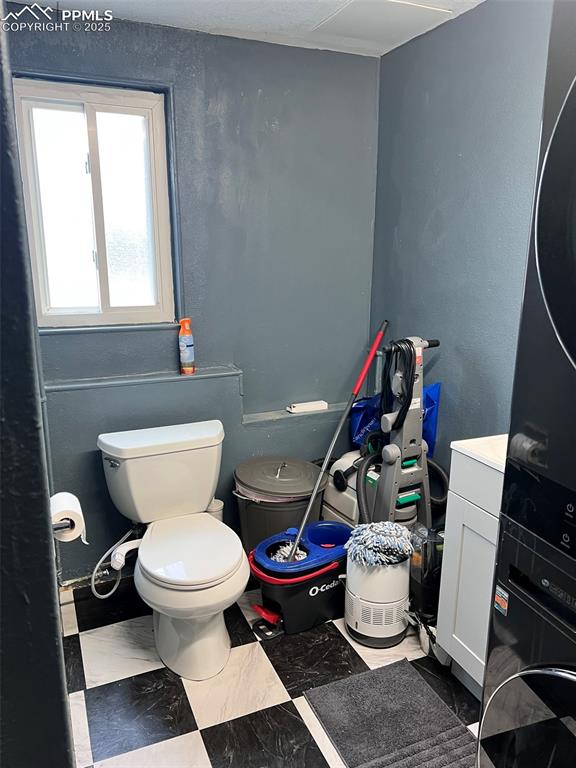 3704 Indianpipe Circle Colorado Springs, CO 80918 - Photo 11 of 12 a bathroom with a toilet and a mirror