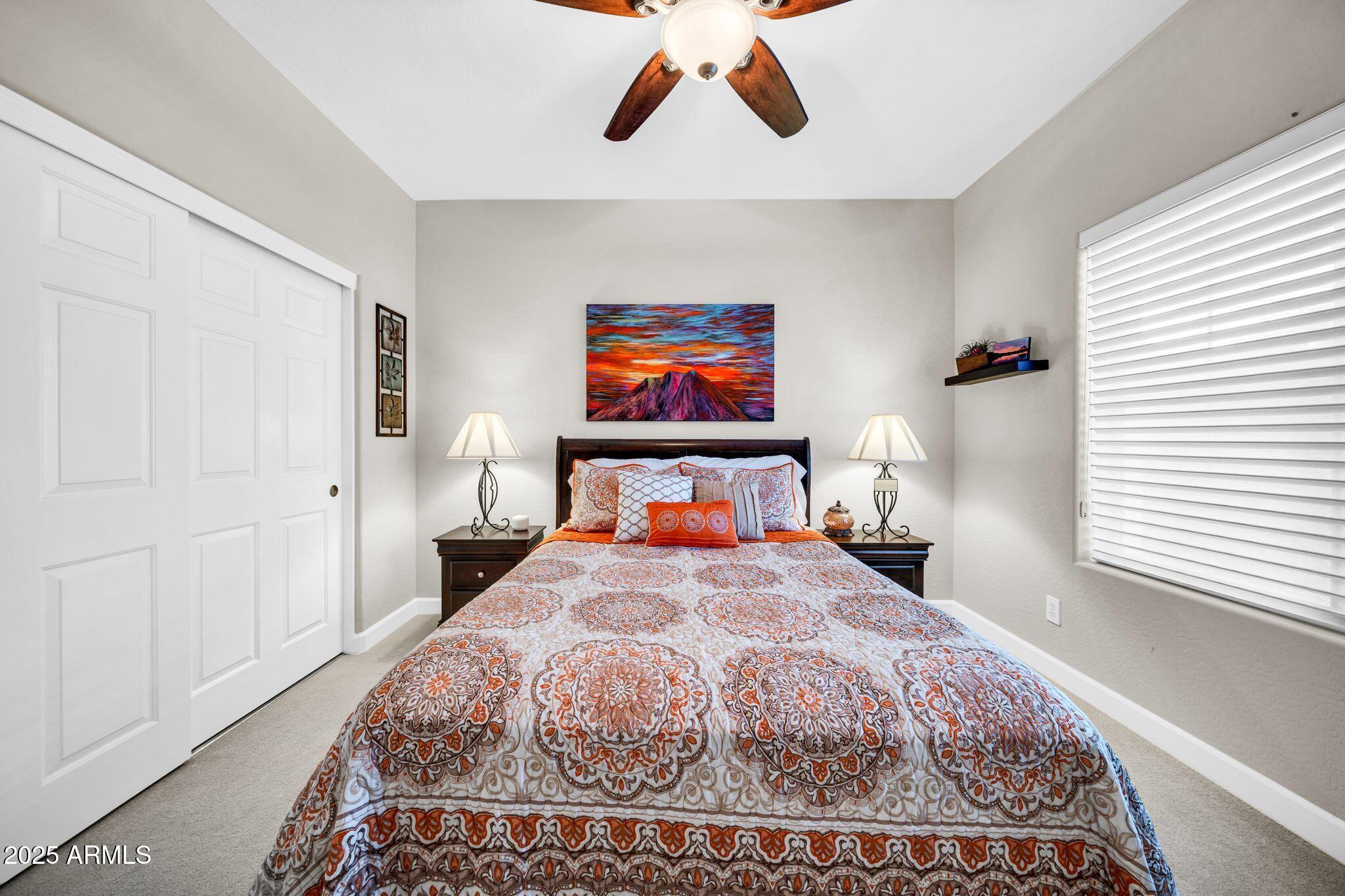 41822 North Crooked Stick Road Anthem, AZ 85086 - Photo 29 of 90 a bedroom with bed and window