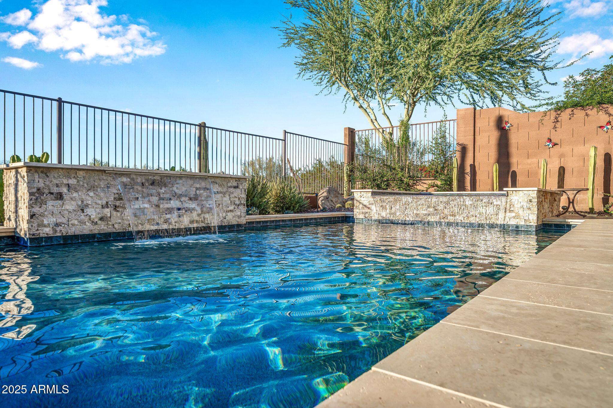 41822 North Crooked Stick Road Anthem, AZ 85086 - Photo 36 of 90 a view of swimming pool with a patio