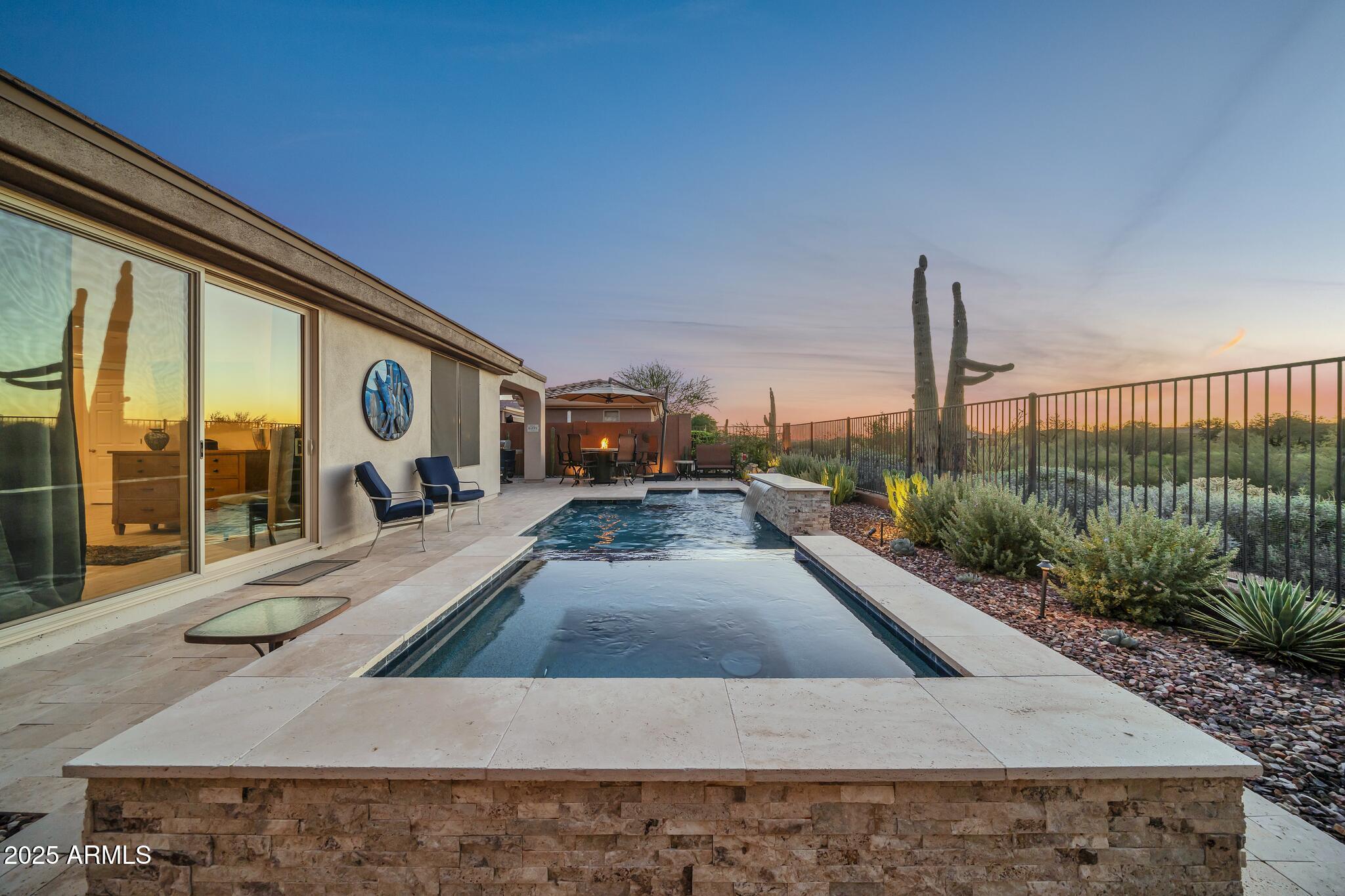 41822 North Crooked Stick Road Anthem, AZ 85086 - Photo 69 of 90 a view of a balcony with couch