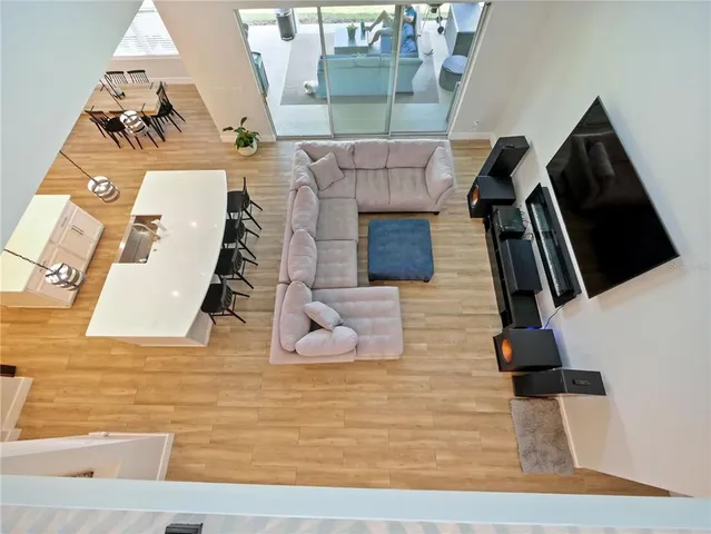 a bedroom with a bed and a tv