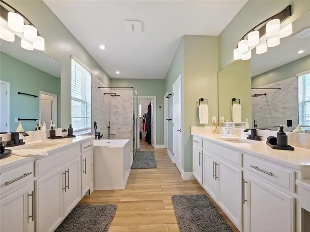 an aerial view of a house with a ocean view