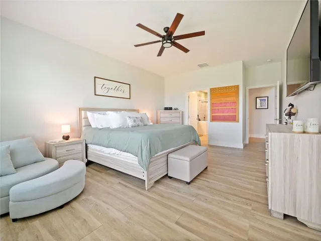 a view of an house with swimming pool and furniture