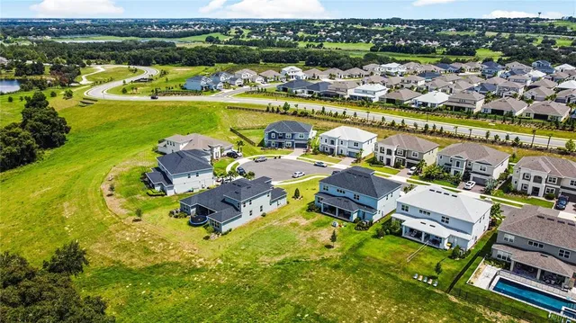 a living room with furniture or couch and a large window