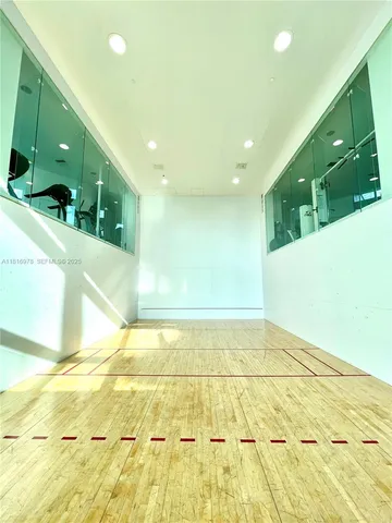 a bathroom with a tub and a sink