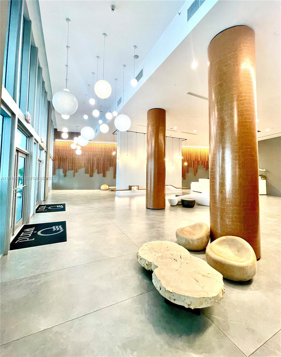 350 South Miami Avenue, Unit 1103 Miami, FL 33130 - Photo 3 of 32 a bathroom with a sink and a mirror