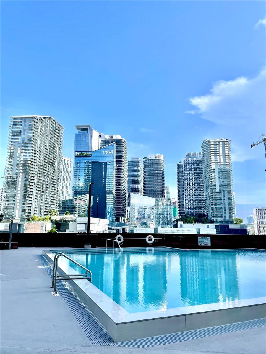 350 South Miami Avenue, Unit 1103 Miami, FL 33130 - Photo 5 of 32 a view of swimming pool in front of building