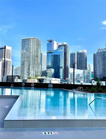 a view of a swimming pool and outdoor space