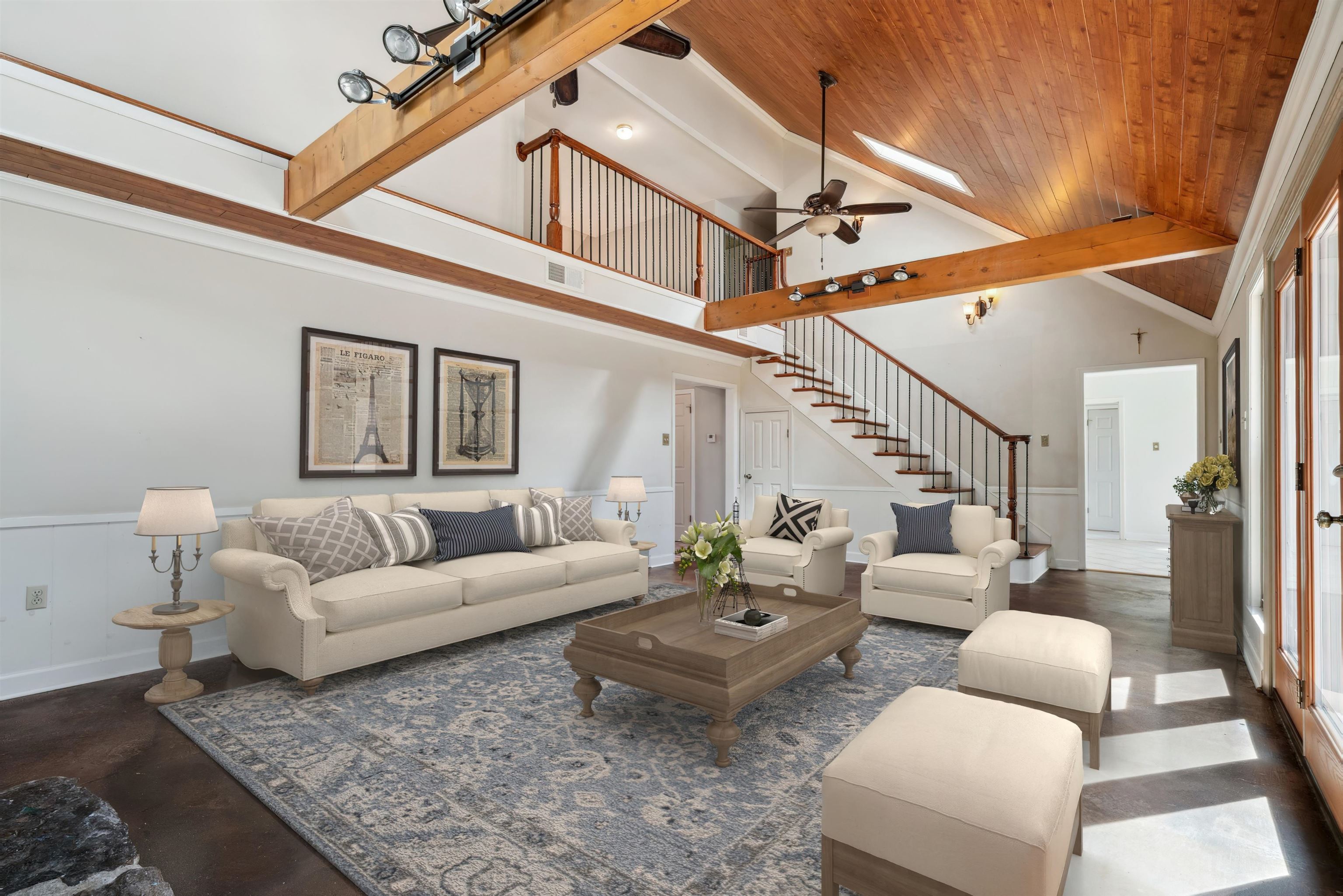 745 Sylvan Road Millington, TN 38053 - Photo 8 of 40 Living room featuring stairs, wainscoting, wood ceiling, and beam ceiling