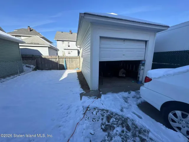 a view of a livingroom with furniture and a fireplace