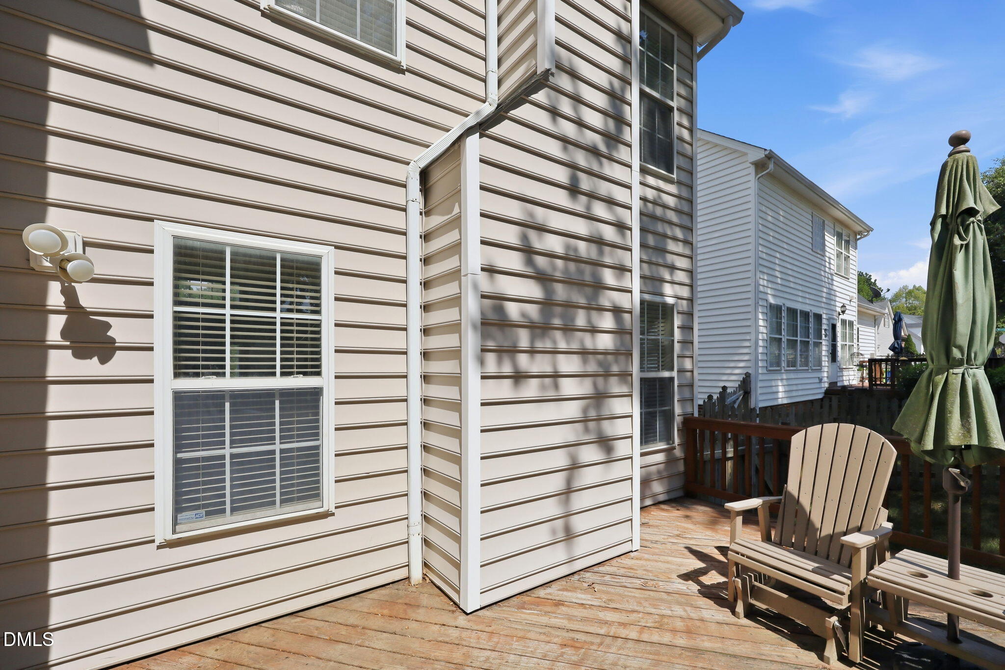 9105 Willow Valley Court Raleigh, NC 27617 - Photo 35 of 51 a view of a deck with chair and wooden floor