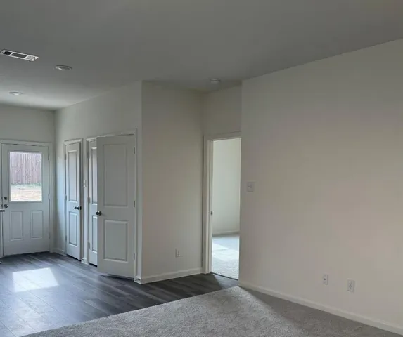 an empty room with windows