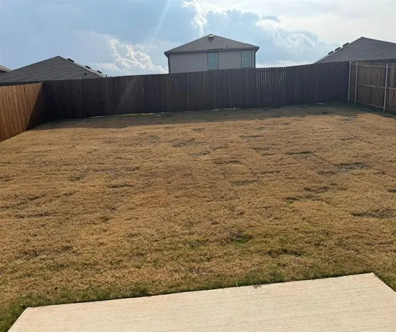 a view of wooden fence