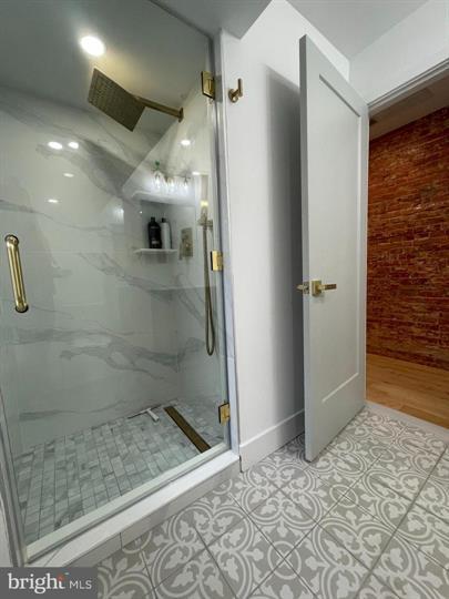 1205 South 4th Street, Unit 2 Philadelphia, PA 19147 - Photo 8 of 12 Elegant second floor shower with modern finishes.