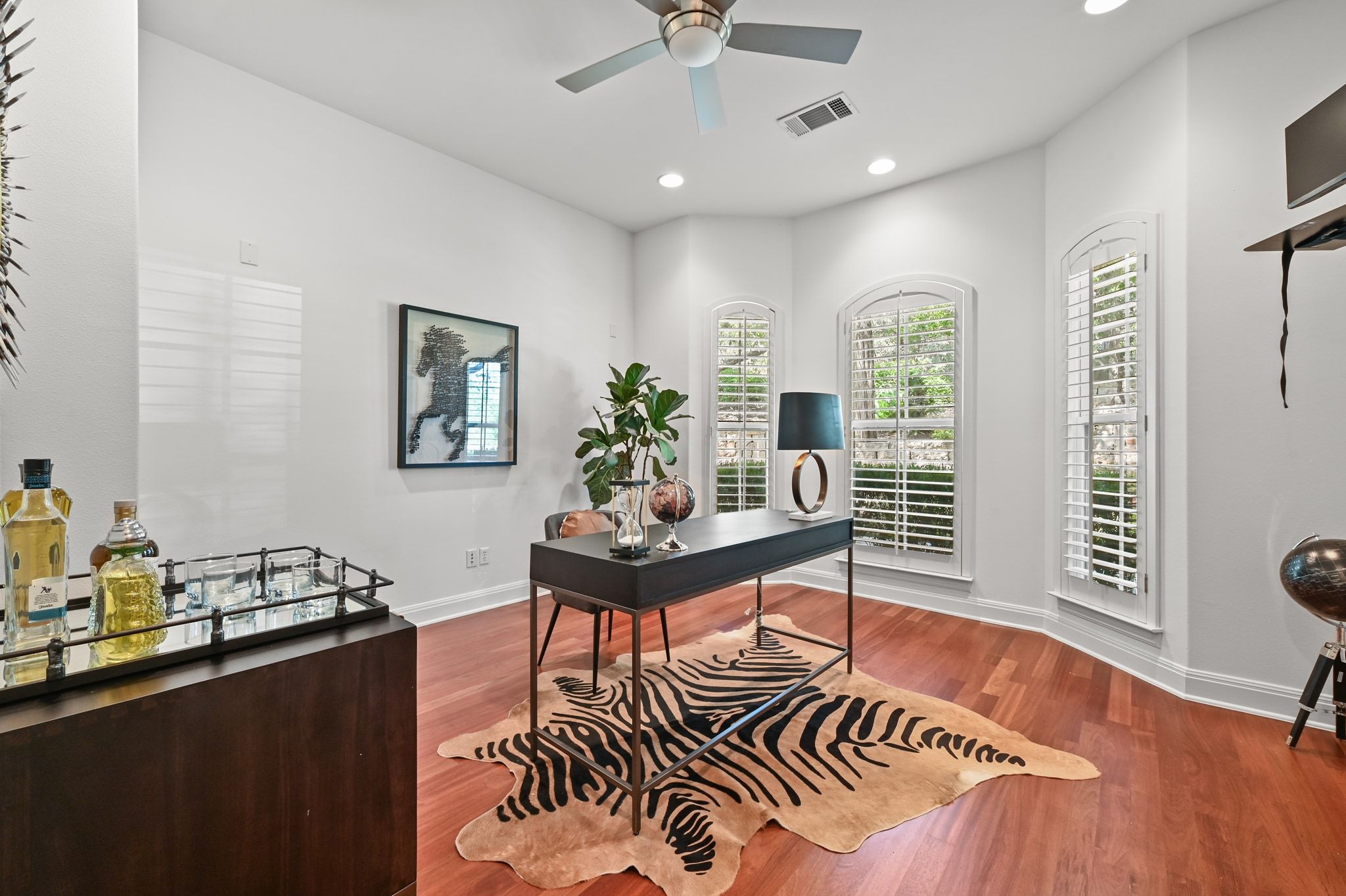 405 Barrett Lane Austin, TX 78733 - Photo 11 of 39 a living room with furniture a window and a potted plant