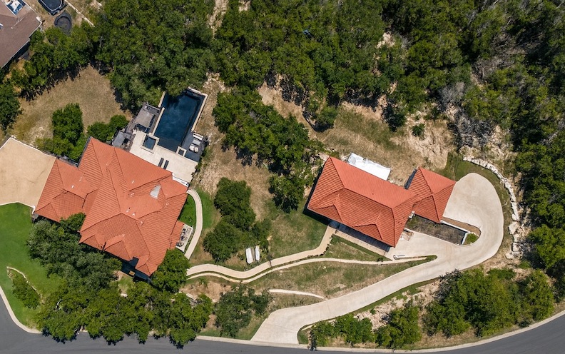 405 Barrett Lane Austin, TX 78733 - Photo 25 of 39 an aerial view of a house with swimming pool and outdoor space