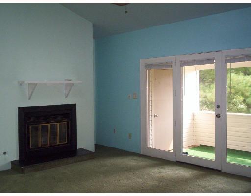 1508 Kenzie Road Pittsburgh, PA 15205 - Photo 2 of 8 Living Room. The condo has a living that features a gas fireplace with doors to a nicely sized deck and storage area. The pool and club house are steps away.