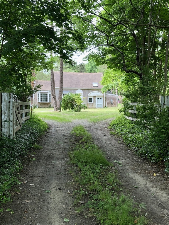 693 Orleans Road North Chatham, MA 02650 - Photo 35 of 41 a house view with a backyard space