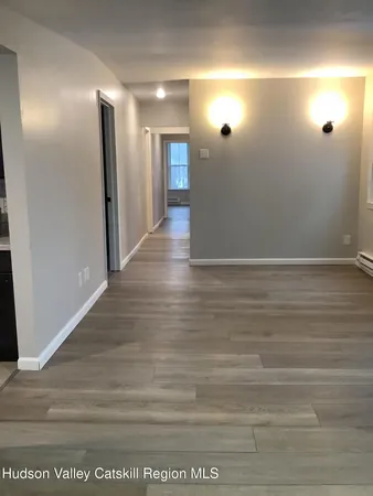 a bathroom with a sink a toilet and a vanity