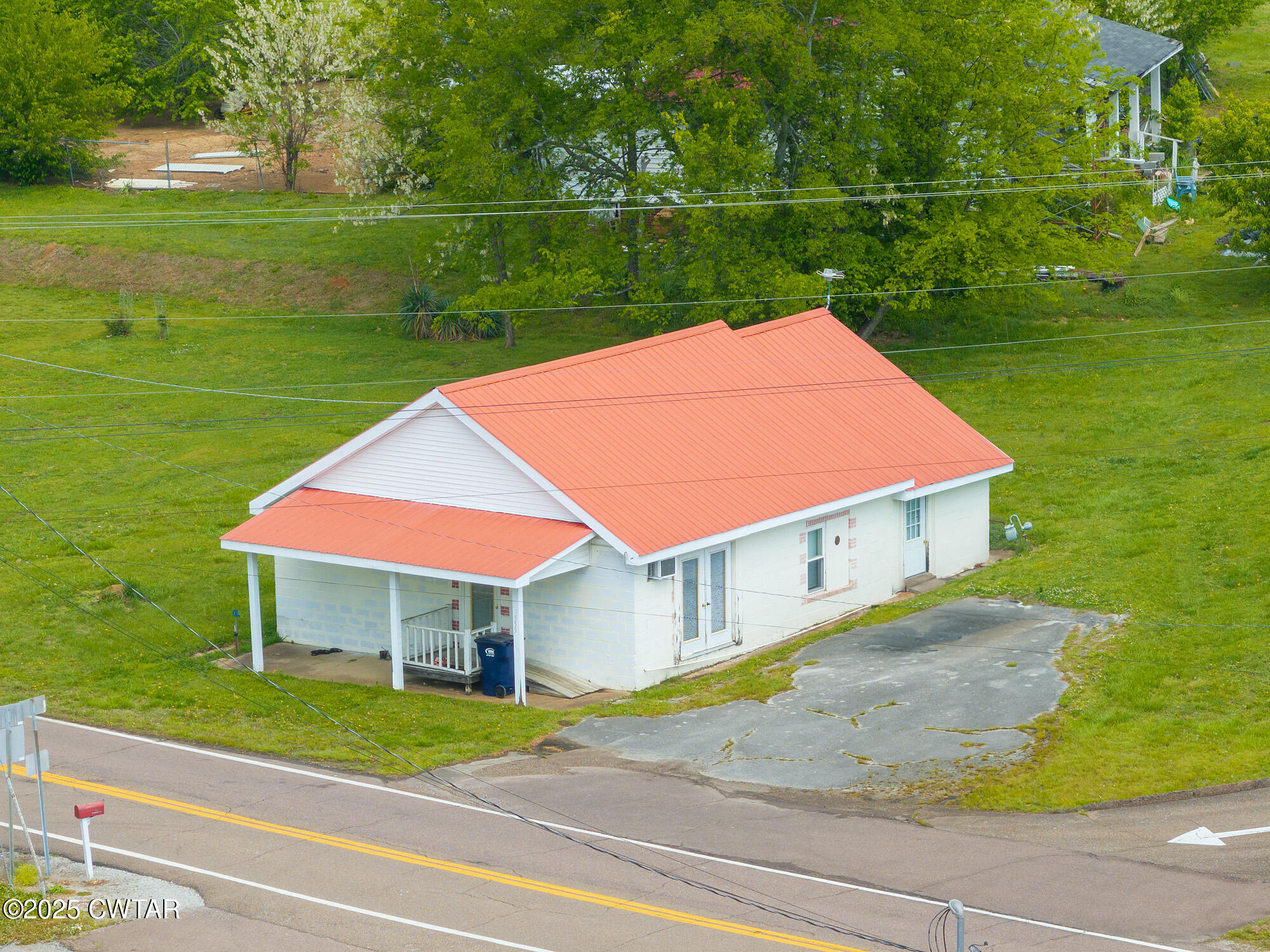 4555 Henderson Road Sardis, TN 38371 - Photo 1 of 19 a view of a yard with a house
