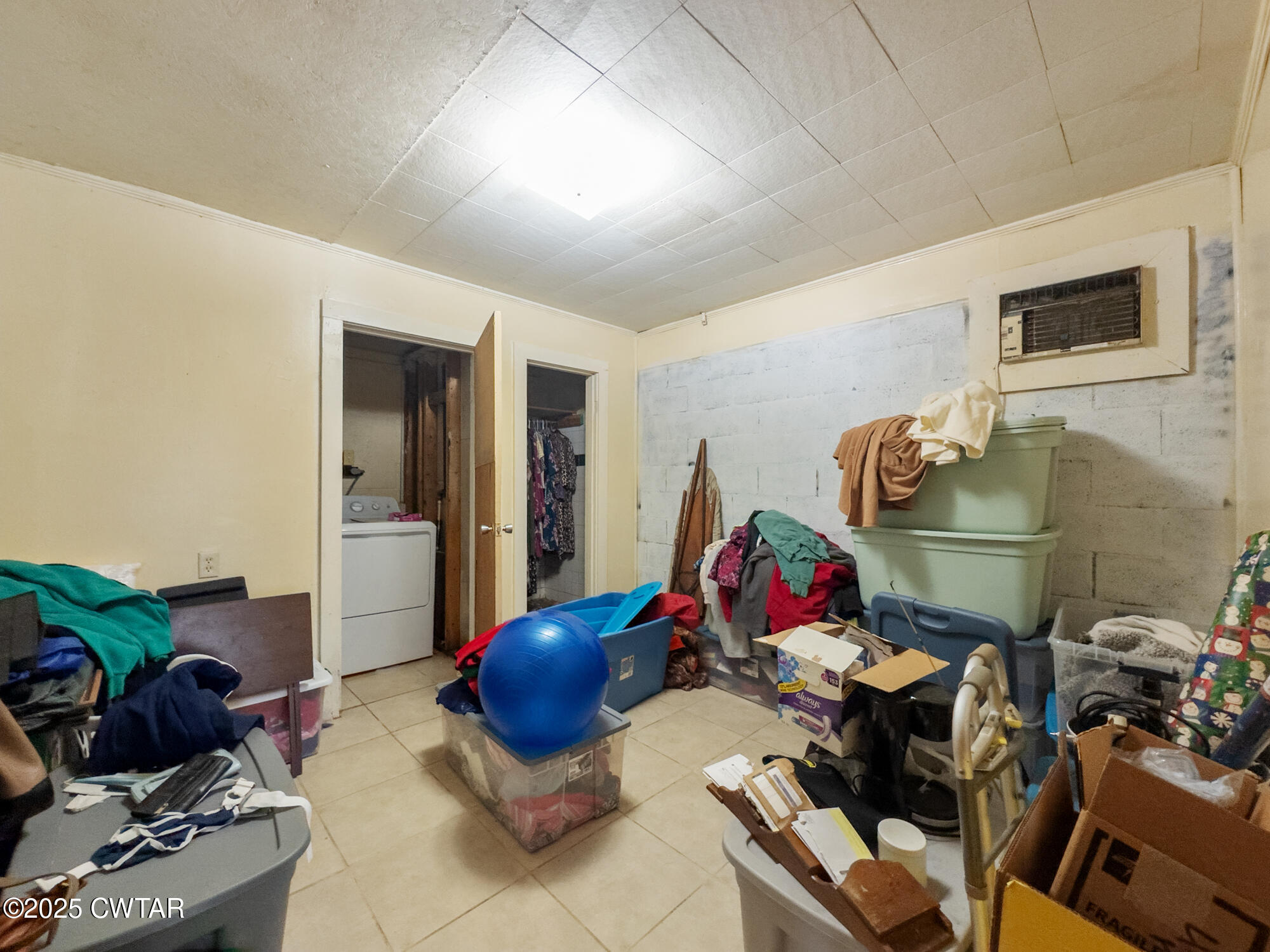 4555 Henderson Road Sardis, TN 38371 - Photo 13 of 19 a living room with furniture a rug and white walls