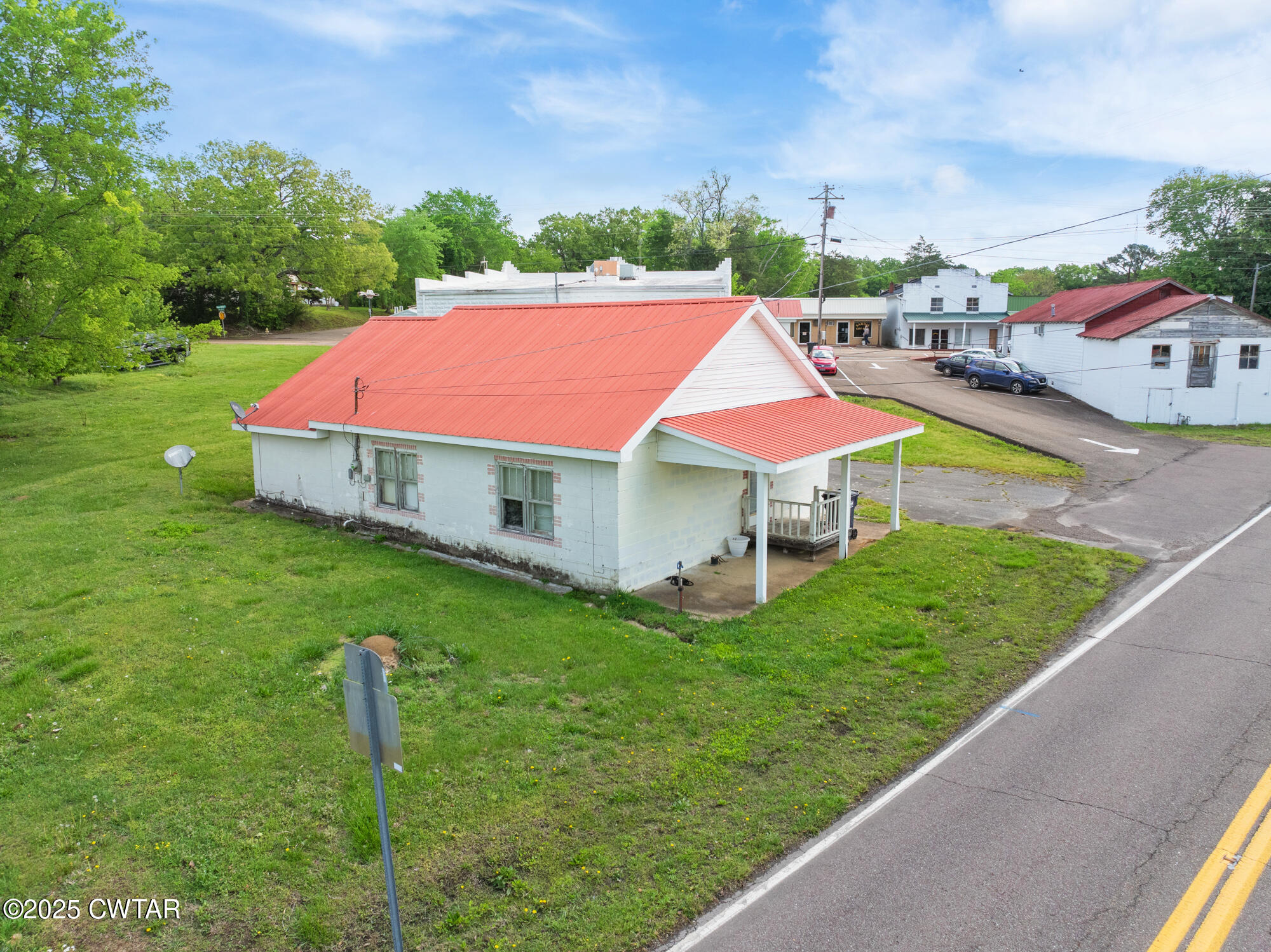 4555 Henderson Road Sardis, TN 38371 - Photo 14 of 19 an aerial view of a house