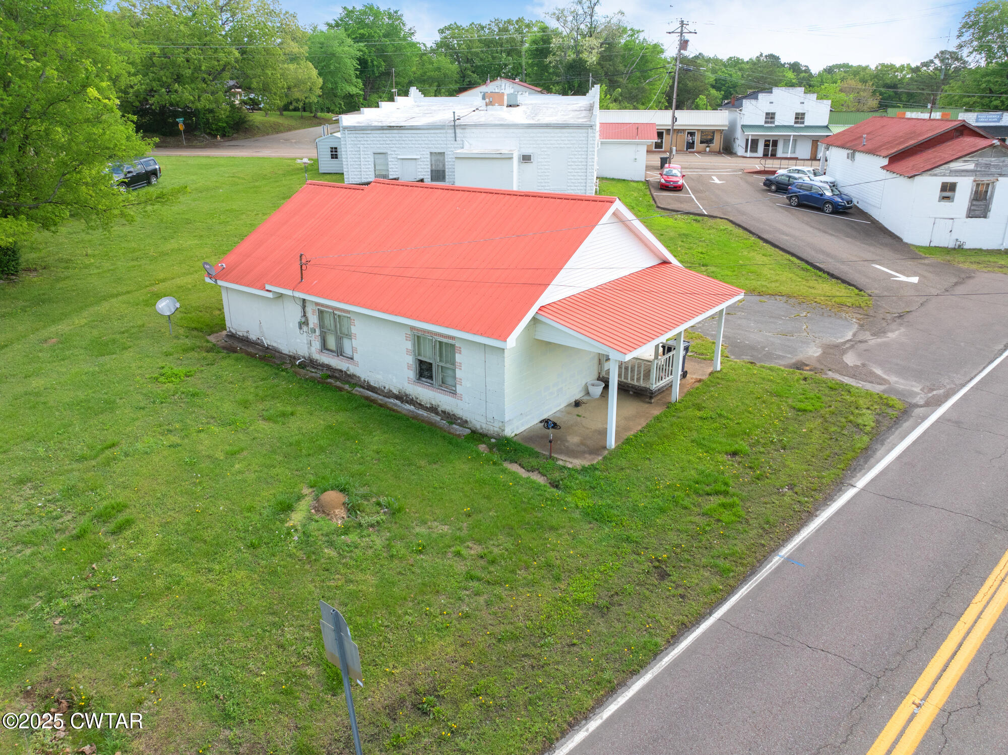 4555 Henderson Road Sardis, TN 38371 - Photo 15 of 19 an aerial view of a house