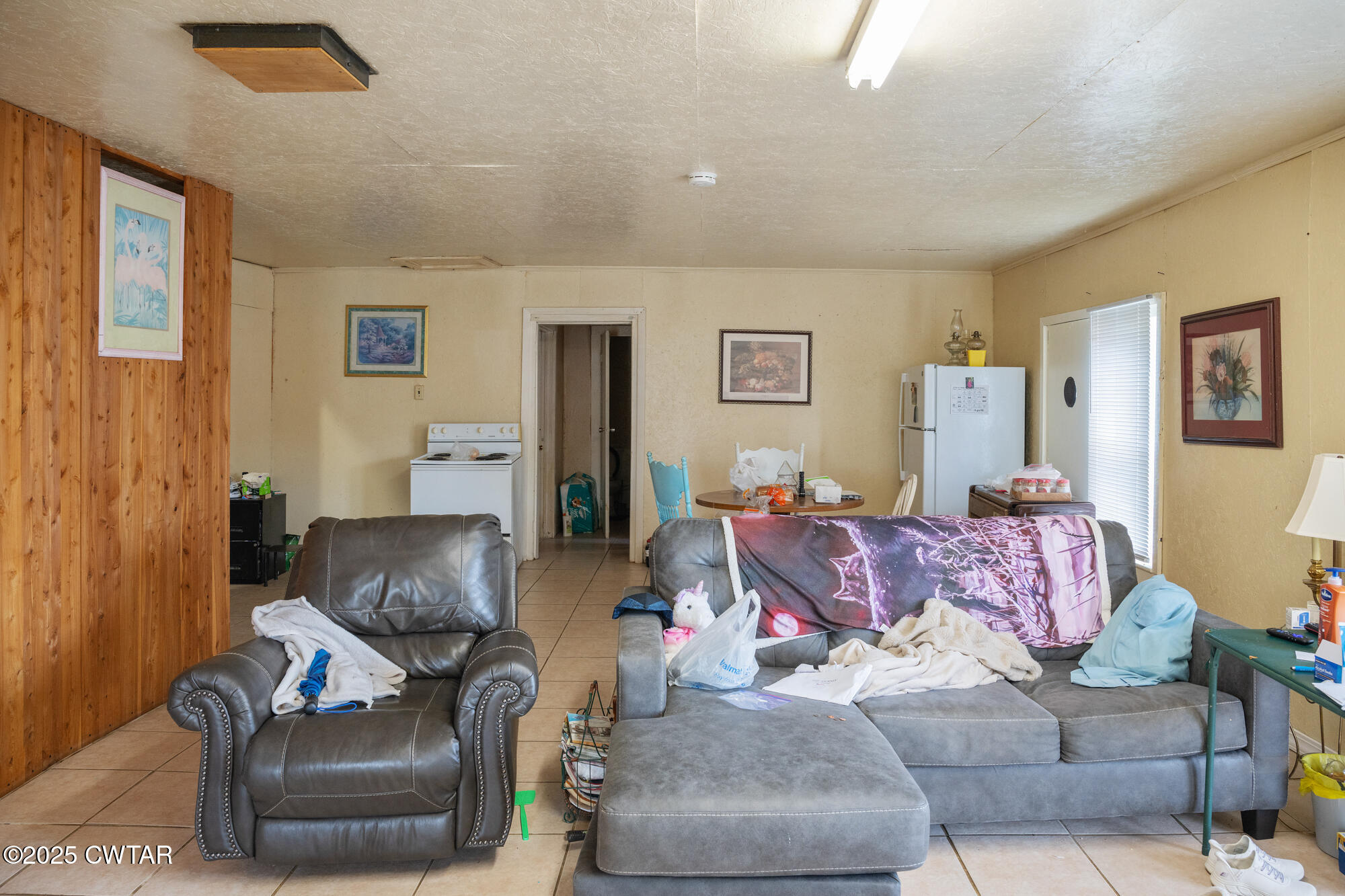 4555 Henderson Road Sardis, TN 38371 - Photo 5 of 19 a living room with furniture and a couch