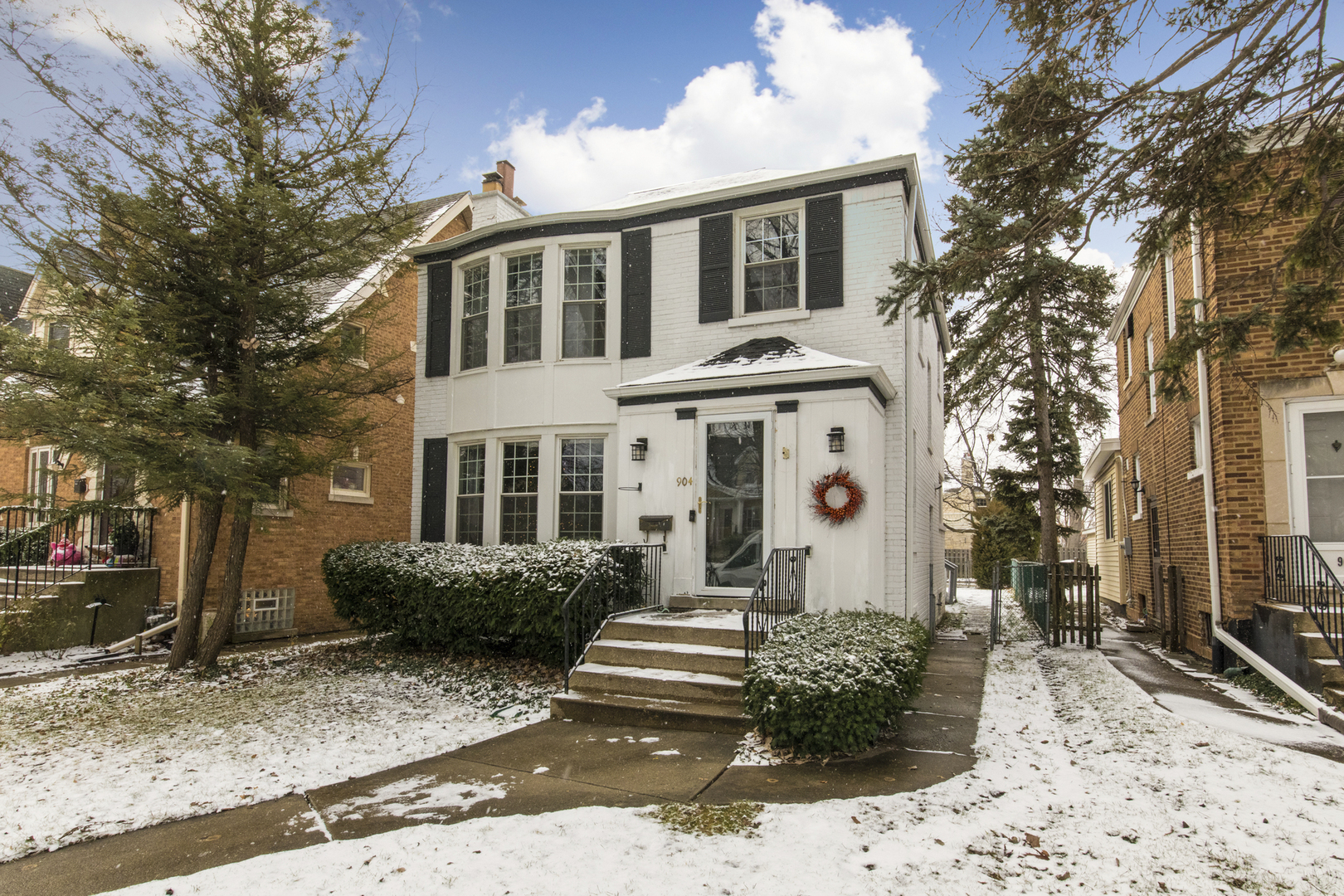904 Harrison Street Park Ridge, IL 60068 - Photo 1 of 20 a front view of a house with a yard and tree s