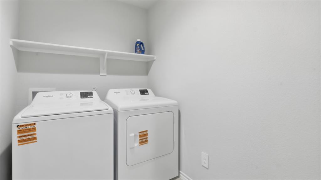 169 MLM Parkway Bridgeport, TX 76426 - Photo 14 of 21 a utility room with dryer and washer