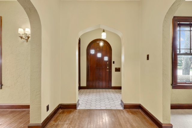 960 Black Road Joliet, IL 60435 - Photo 3 of 41 wooden floor in a hall with a window