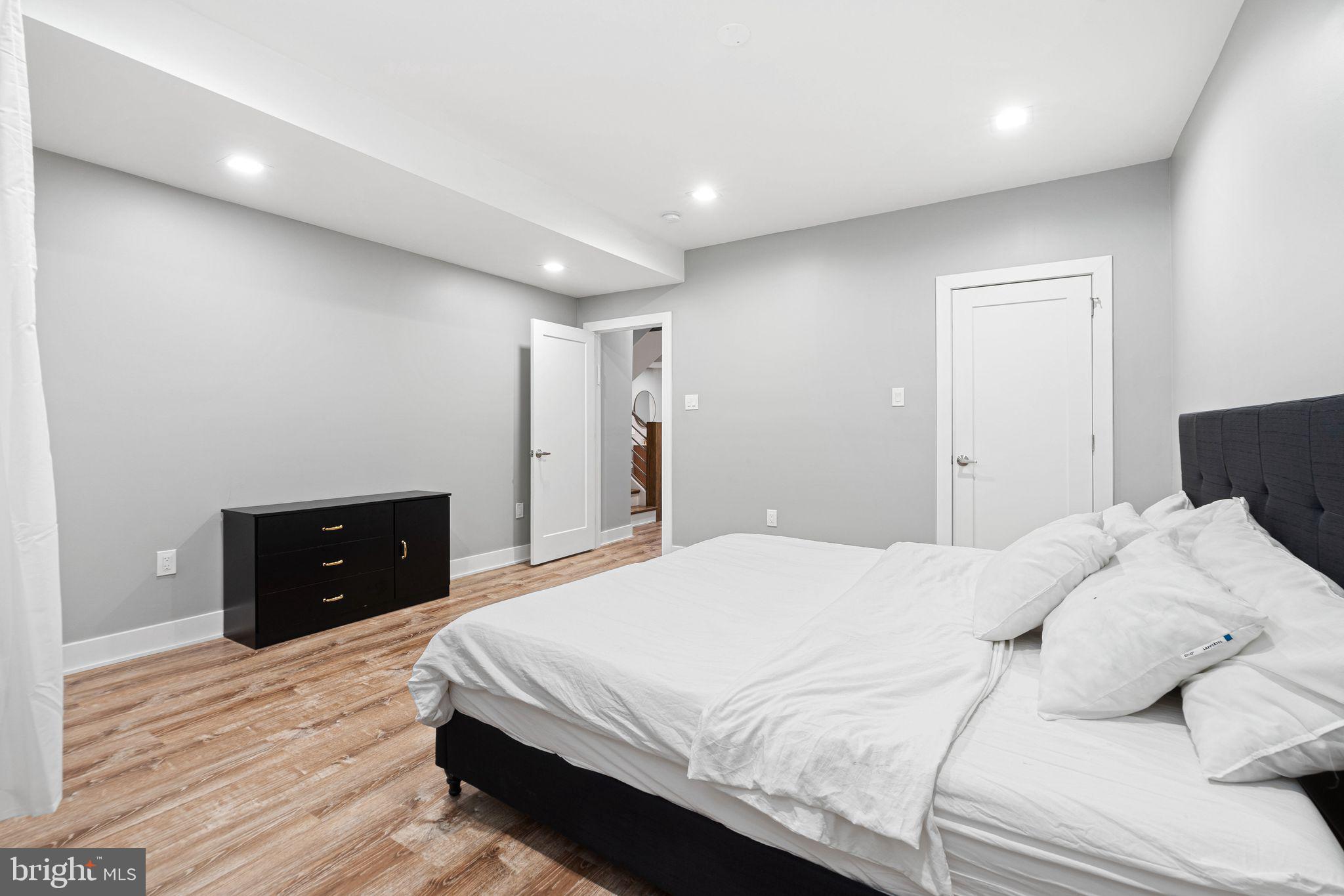 1224 Norwalk Road Philadelphia, PA 19115 - Photo 19 of 47 a bedroom with a bed and a walk in closet