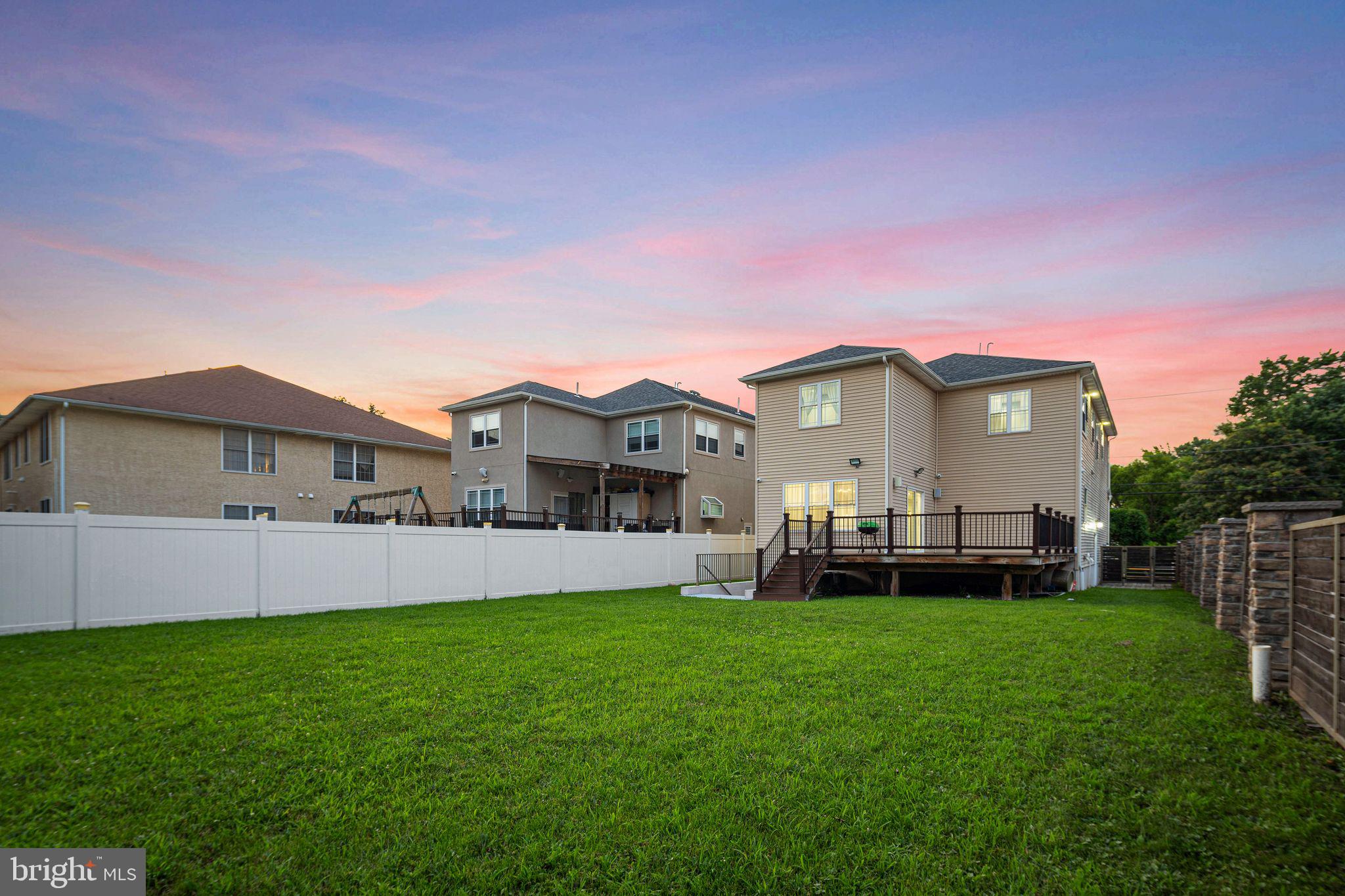1224 Norwalk Road Philadelphia, PA 19115 - Photo 47 of 47 a front view of a house with a garden and deck