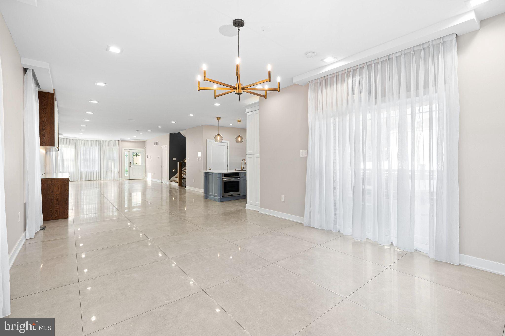 1224 Norwalk Road Philadelphia, PA 19115 - Photo 5 of 47 a view of a kitchen with a chandelier