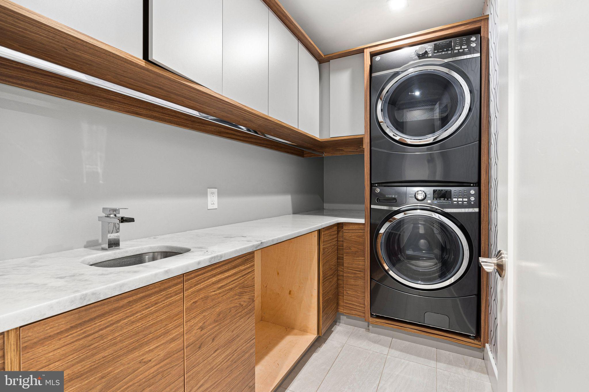 1224 Norwalk Road Philadelphia, PA 19115 - Photo 9 of 47 a utility room with sink dryer and washer