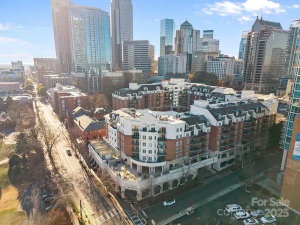 a view of a city with tall buildings