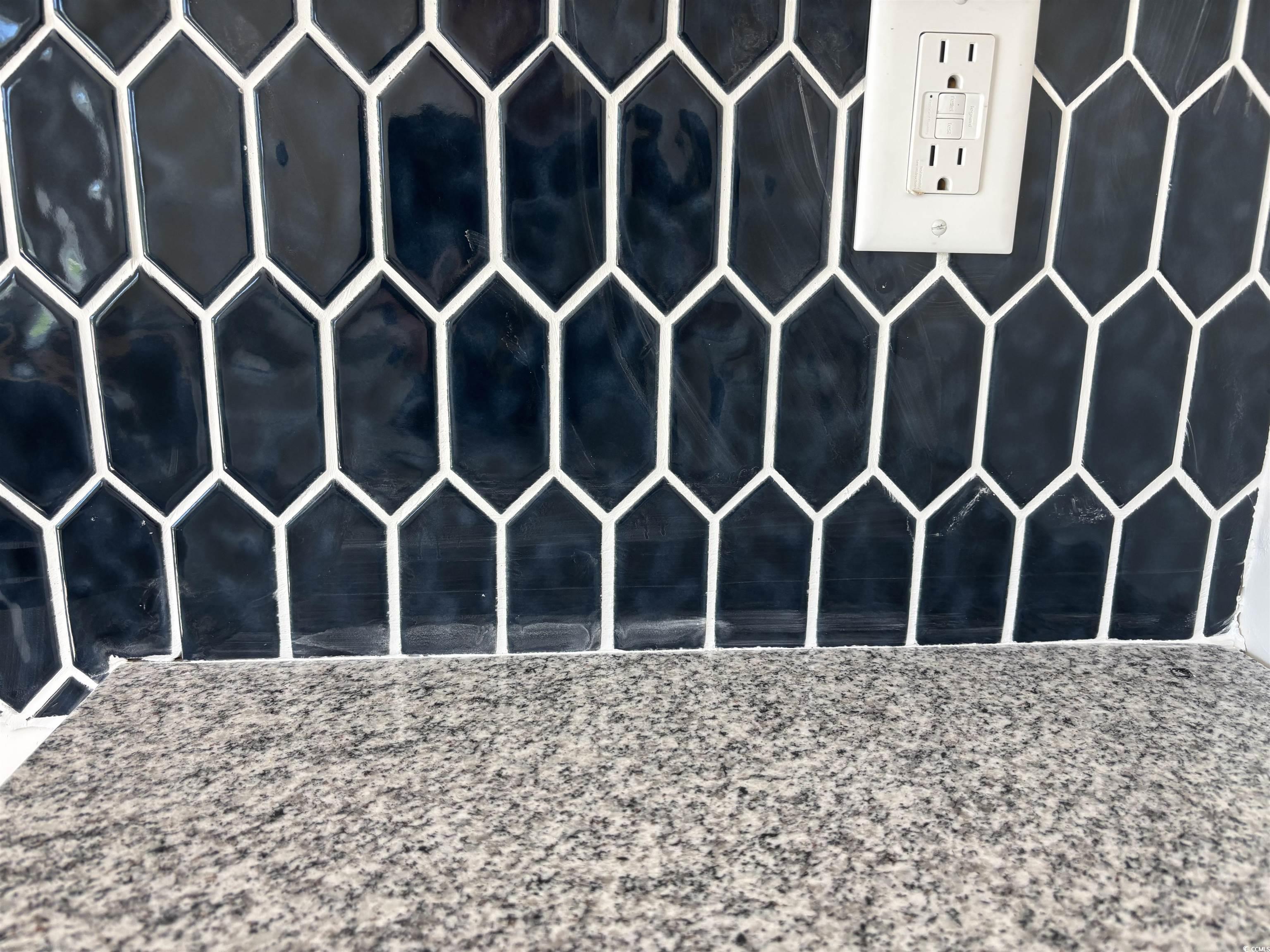 8545 Pee Dee Highway Conway, SC 29527 - Photo 11 of 34 Detailed view of stone counters and dark cabinets