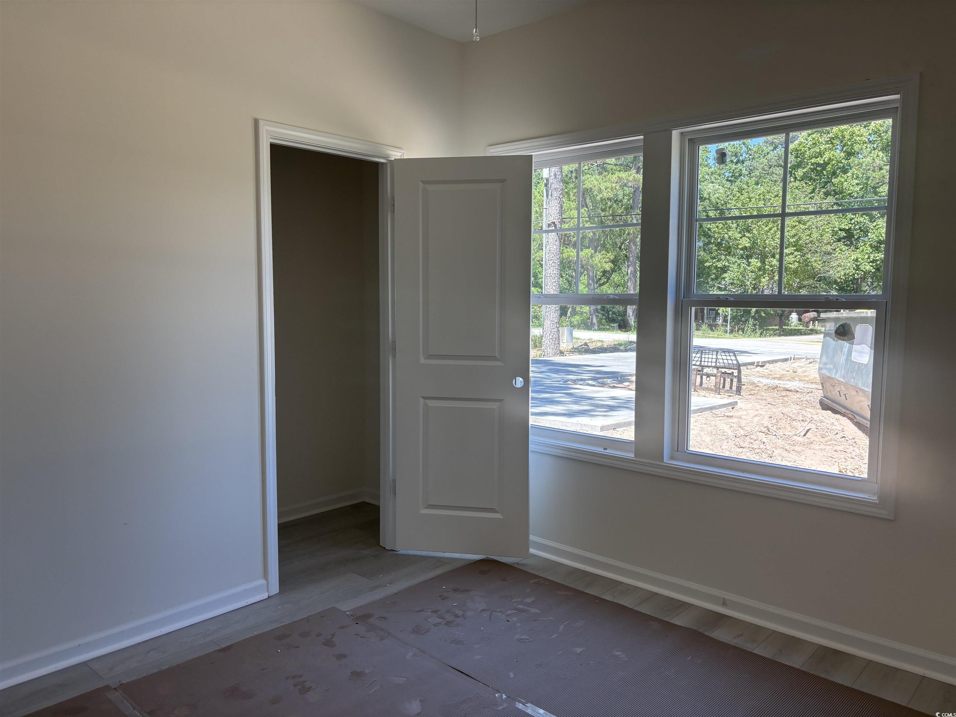 8545 Pee Dee Highway Conway, SC 29527 - Photo 16 of 34 Empty room with baseboards and wood finished floor