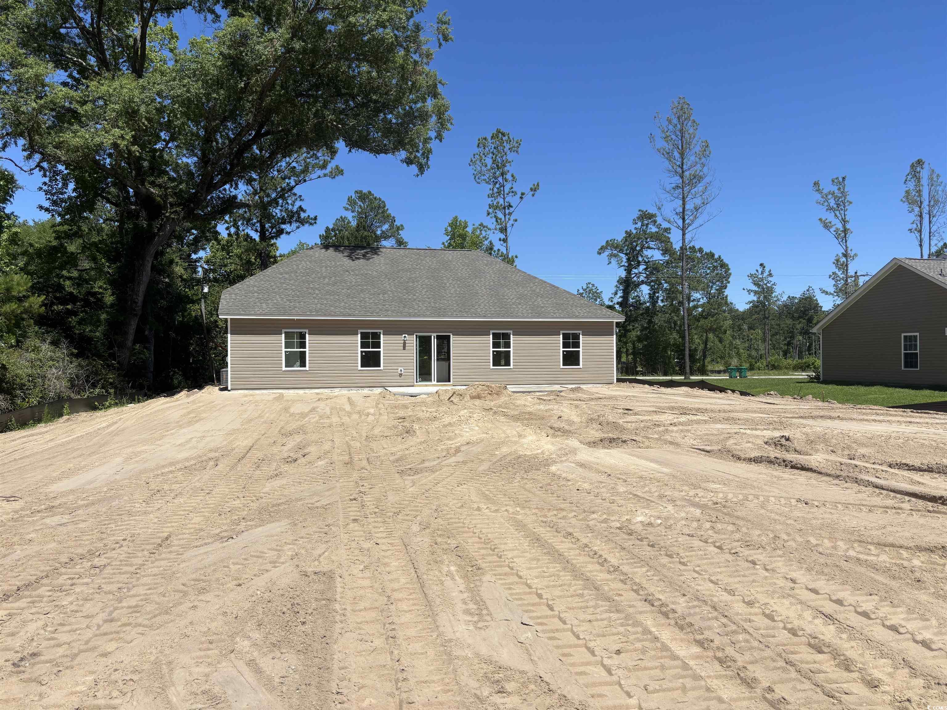 8545 Pee Dee Highway Conway, SC 29527 - Photo 3 of 34 Rear view of house featuring driveway