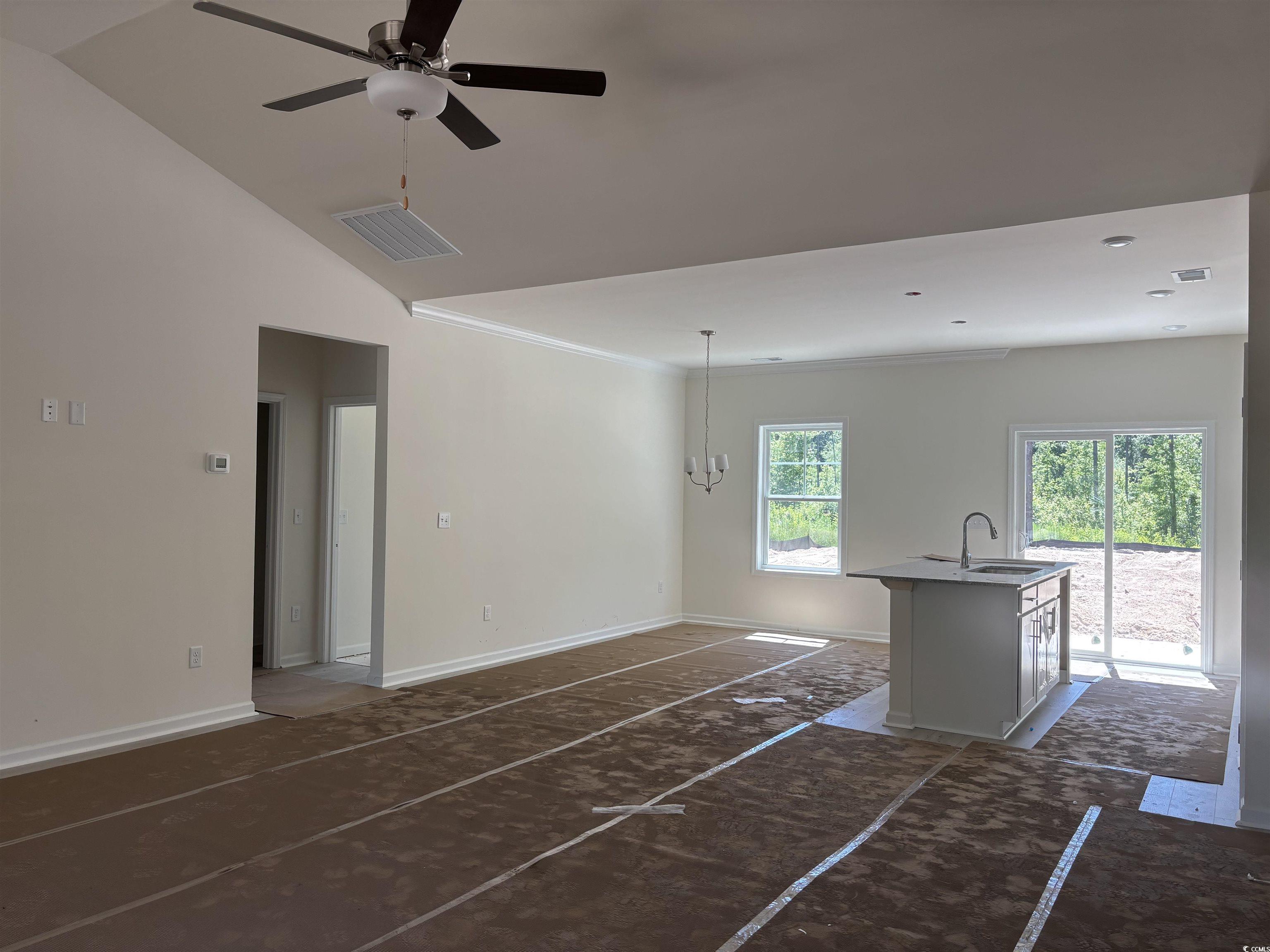 8545 Pee Dee Highway Conway, SC 29527 - Photo 6 of 34 Unfurnished living room with a sink, ceiling fan,